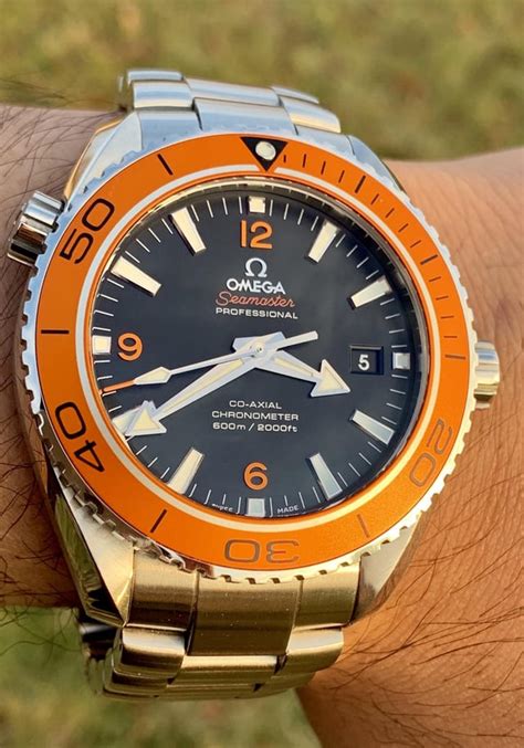 omega planet ocean orange bezel